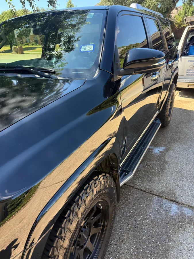Mirror finish on a black SUV